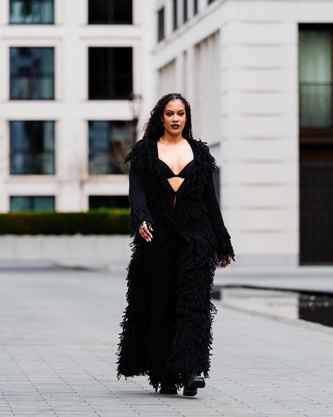 Woman Dressed in the Onyx bt Amarelis set Bold effortless and unapologetic